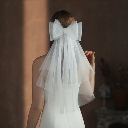 V302 White Bridal Veil with a bow Pearls Bows Multi-Layer Semi-Transparent Tulle Shoulder Length Brides Veil with Hair Comb
