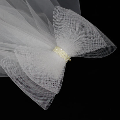 V302 White Bridal Veil with a bow Pearls Bows Multi-Layer Semi-Transparent Tulle Shoulder Length Brides Veil with Hair Comb