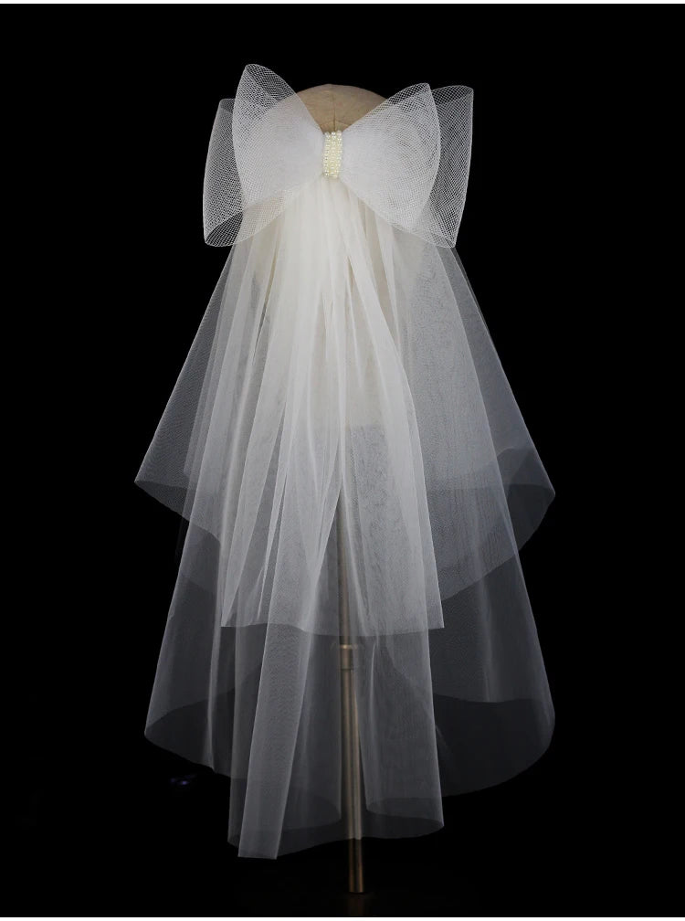 V302 White Bridal Veil with a bow Pearls Bows Multi-Layer Semi-Transparent Tulle Shoulder Length Brides Veil with Hair Comb