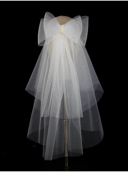 V302 White Bridal Veil with a bow Pearls Bows Multi-Layer Semi-Transparent Tulle Shoulder Length Brides Veil with Hair Comb