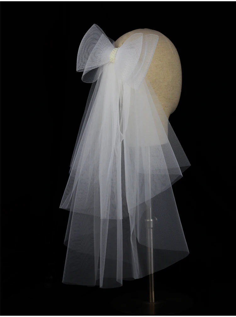 V302 White Bridal Veil with a bow Pearls Bows Multi-Layer Semi-Transparent Tulle Shoulder Length Brides Veil with Hair Comb