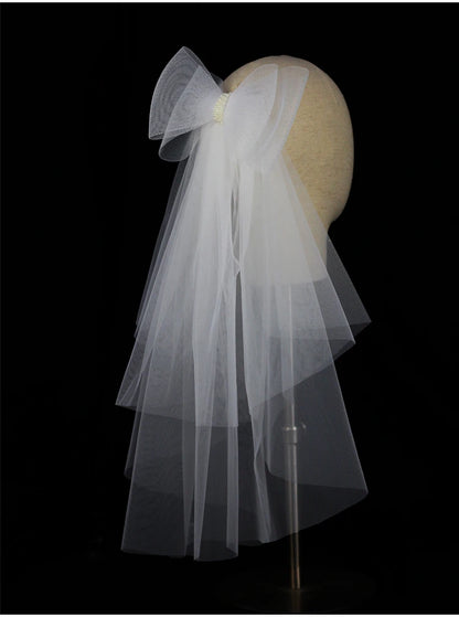 V302 White Bridal Veil with a bow Pearls Bows Multi-Layer Semi-Transparent Tulle Shoulder Length Brides Veil with Hair Comb